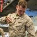 15TH MEU Marine participates in saber drills on America