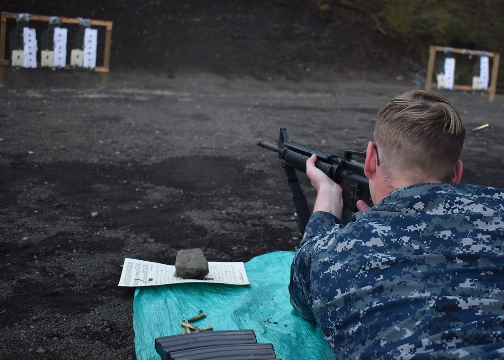 USS Blue Ridge Sailors shoot for the M16 and M500 gun qualifications at Combined Arms Training Center, Camp Fuji.