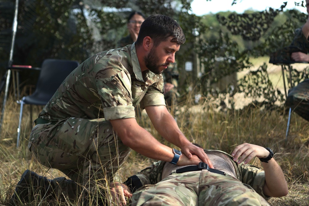 U.S. Marine and British Royal Navy Service Members Receive First Aid Training