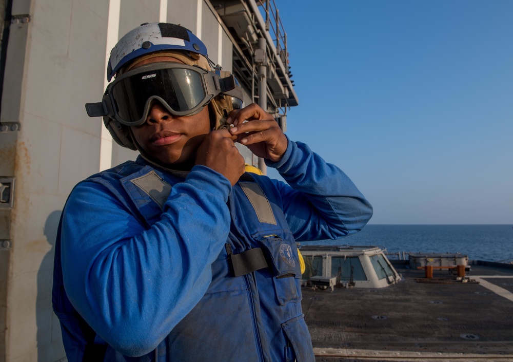 Sailor conducts flight operations