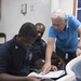 NCPACE instructor assists USS Lake Erie (CG 70) Sailors