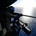 USS San Diego (LPD 22) Crew Chief Shoots .50 Caliber Machine Gun