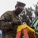 U.S. Marines with Combat Logistics Battalion 3 help build community playground