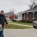 Safety personnel deliver Halloween treat bags to Fort McCoy families