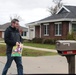 Safety personnel deliver Halloween treat bags to Fort McCoy families