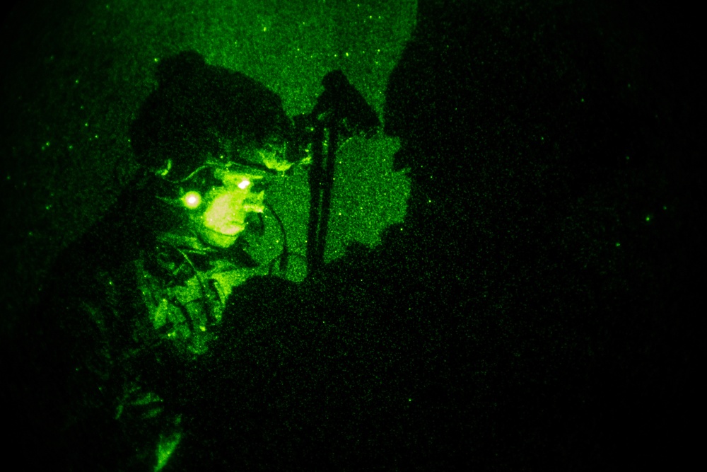 Maritime Raid Force Moves through the Shadows during Night Raid