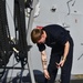 USS San Diego (LPD 22) Sailor Replaces Halyards