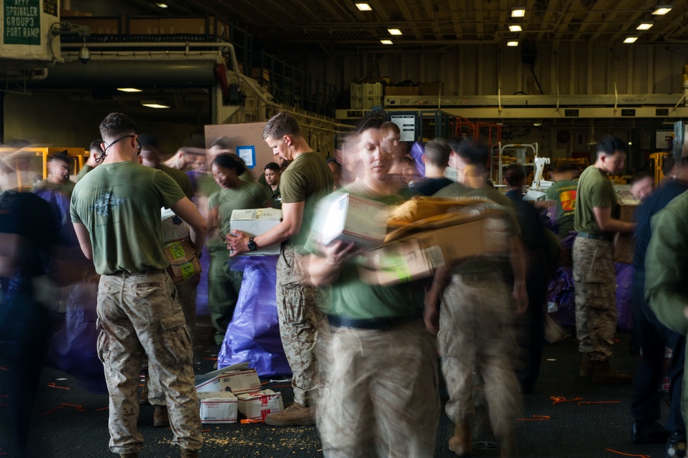 USS America conducts vertical replenishment