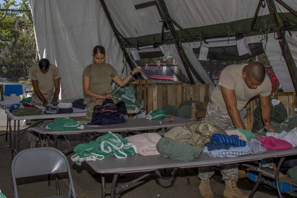 Soldiers Fold Laundry