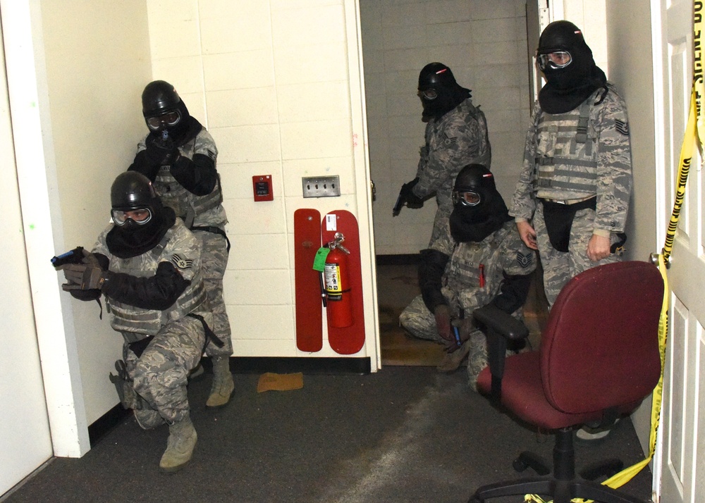 Security Forces Members practice room clearing procedures