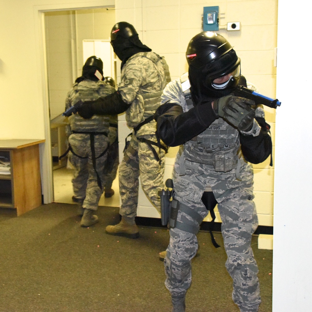 Security Forces Members practice room clearing procedures