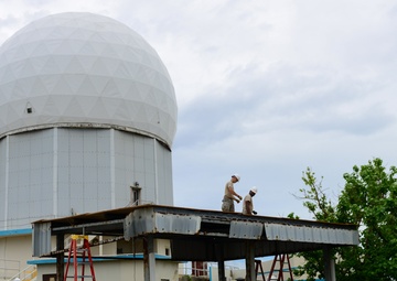 Civil Engineering Airmen repair a fuel shelter