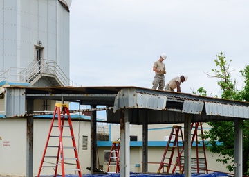 Civil Engineering Airmen repair a fuel shelter