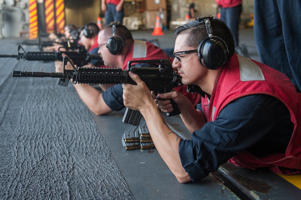 USS America Sailors participate in live fire exercise