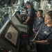 USS America Sailor steers helm