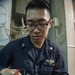USS America Sailor conducts maintenance on limit switch
