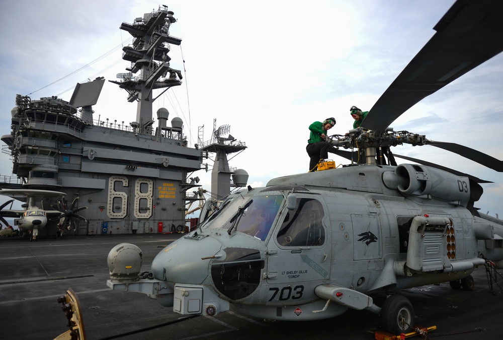 Sailors Perform Aircraft Maintenance