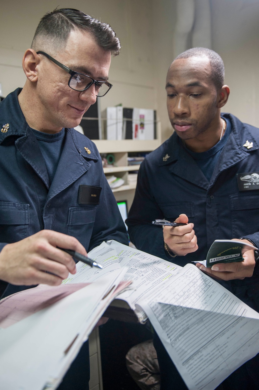 USS America Sailors verify health assessments