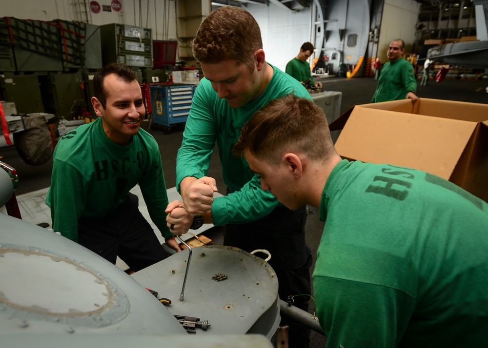 Sailors Works On Helicopter