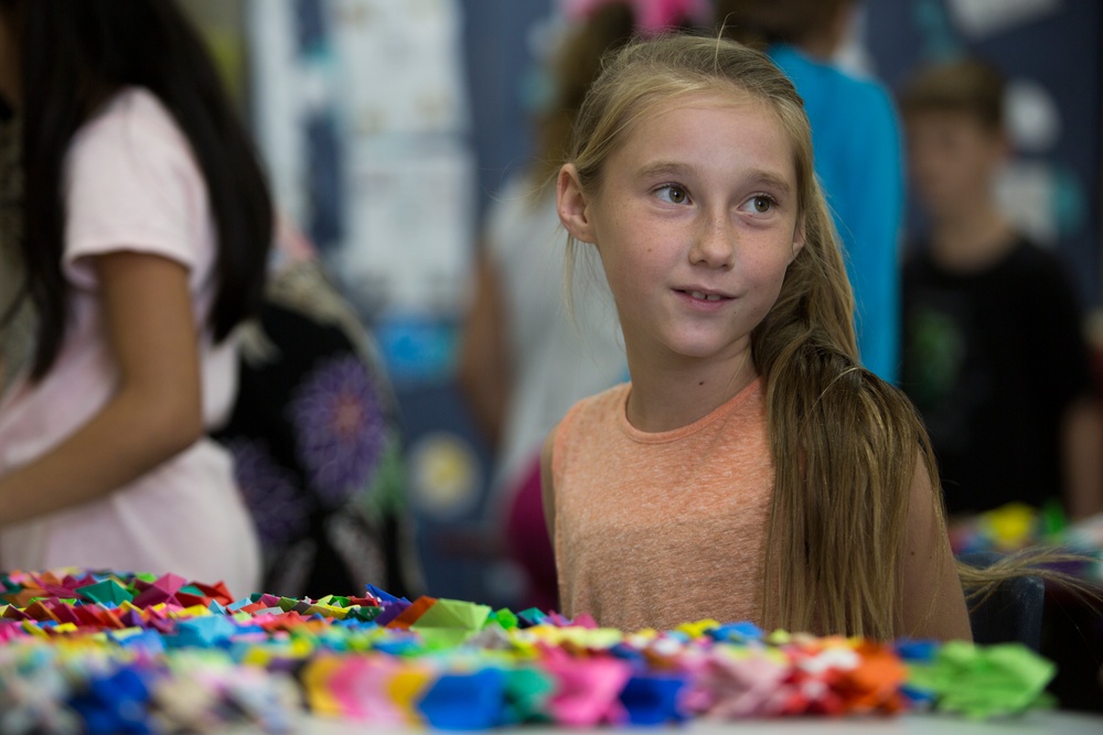 Kinser Elementary School gives 1,000 Cranes of Hope to Antilles Elementary School