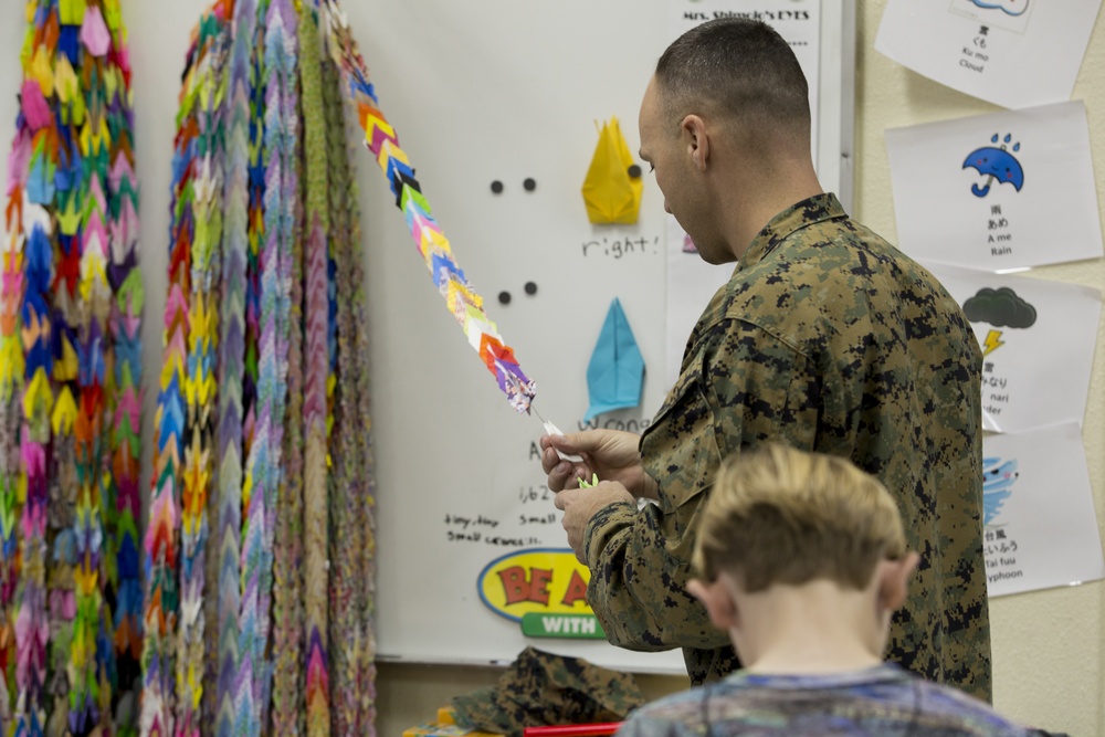 Kinser Elementary School gives 1,000 Cranes of Hope to Antilles Elementary School