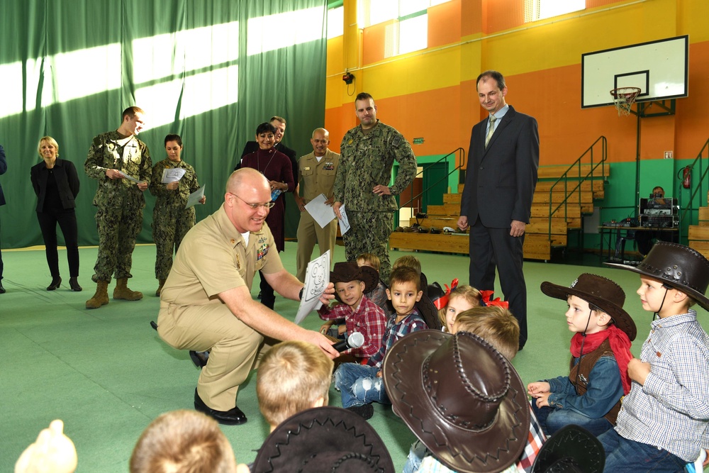 Sailors from Naval Support Facility (NSF) Redzikowo visit a local school in Potegowo, Poland