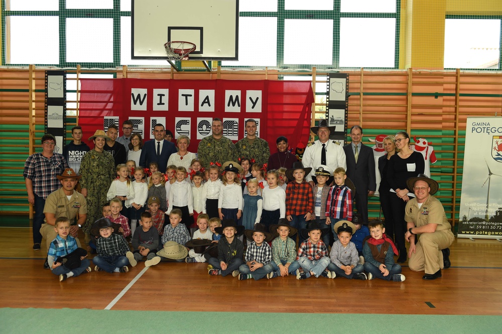 Sailors from Naval Support Facility (NSF) Redzikowo visit a local school in Potegowo, Poland