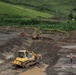 Workers and Earthmoving Machines Build Emergency Levee, Puerto Rico