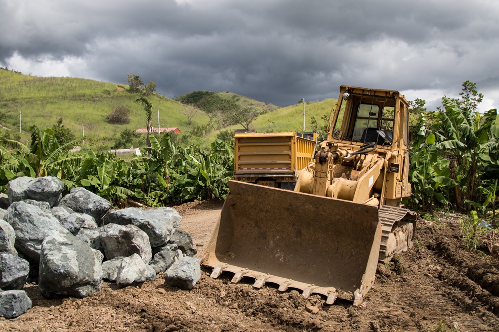 Earthmoving Equipment Sits Staged for USACE Emergency Levee Project, Puerto Rico