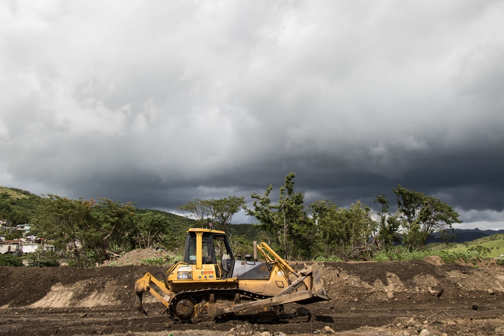 Earthmoving Equipment Sits Staged for USACE Emergency Levee Project, Puerto Rico