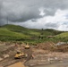 Workers and Earthmoving Machines Build Emergency Levee, Puerto Rico