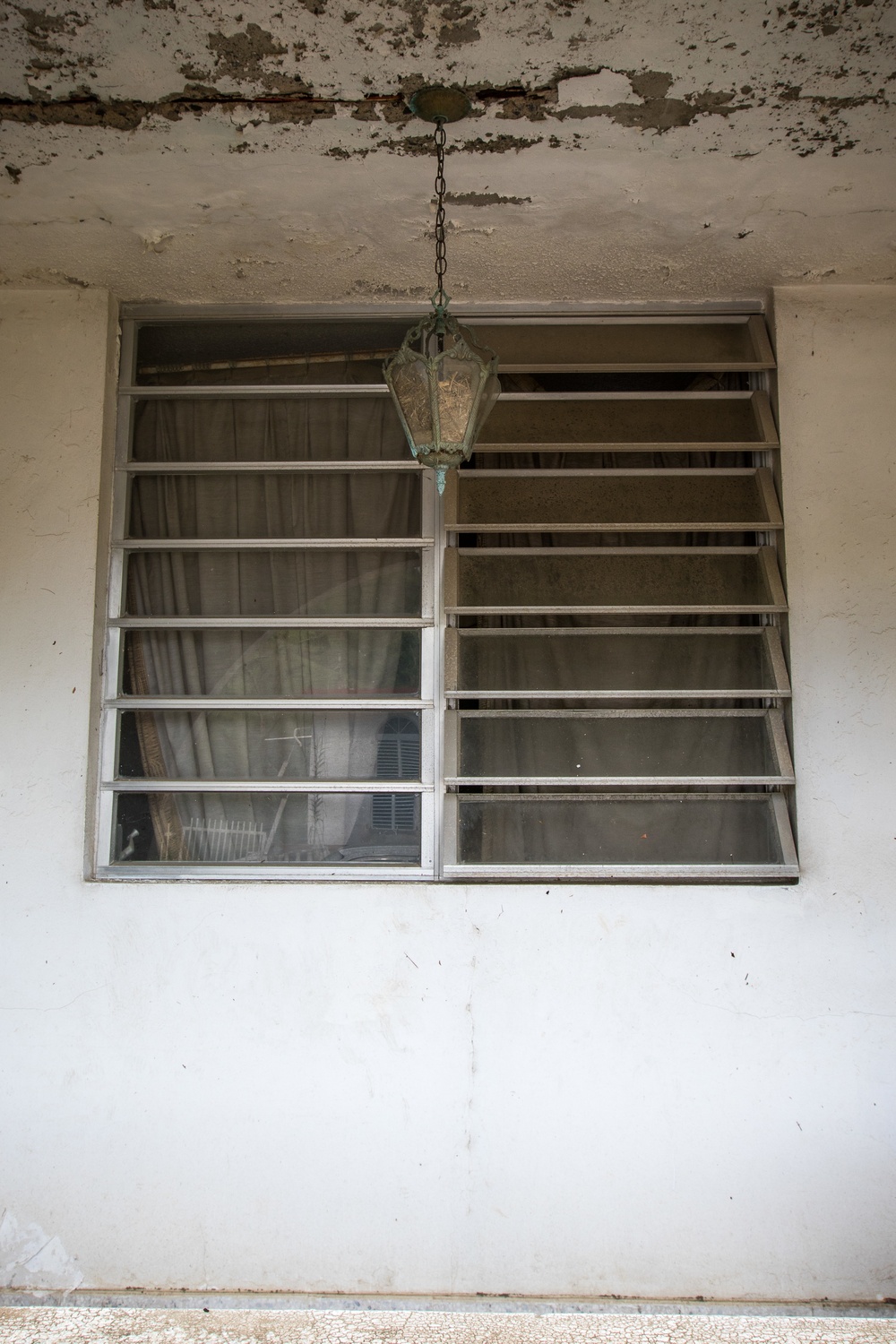 Pendant Light Filled with River Muck after Hurricane Maria Flooding, Puerto Rico