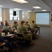 Deploying Sailors are Briefed