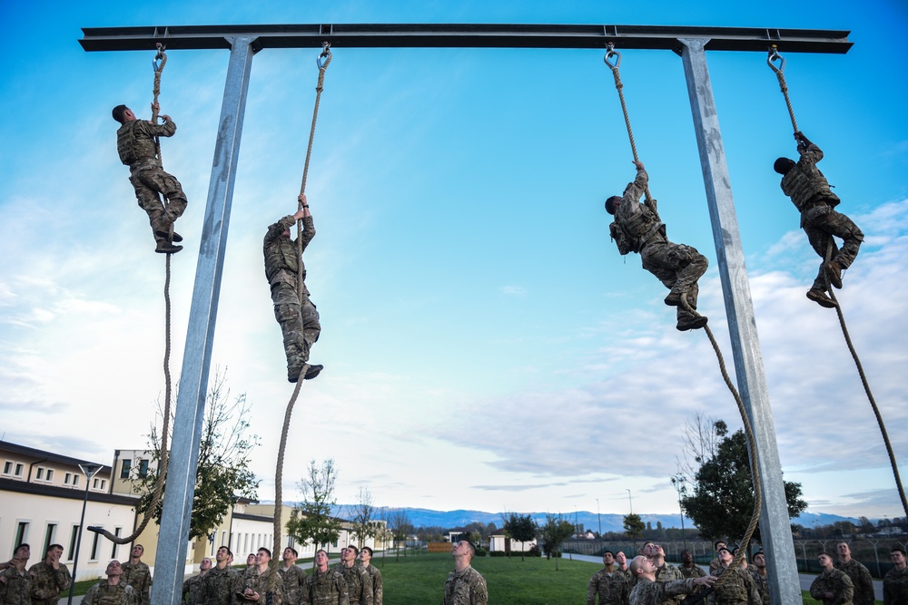 Paratroopers negotiate rope climb during The Brostrom Challenge
