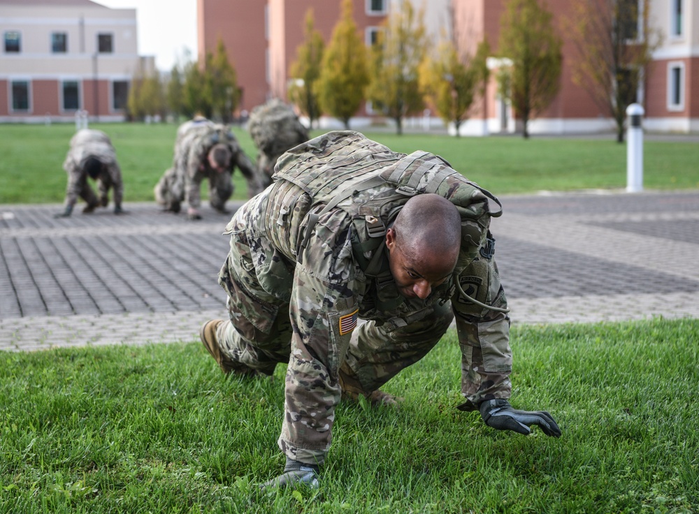 Paratroopers conduct bear crawl during The Brostrom Challenge