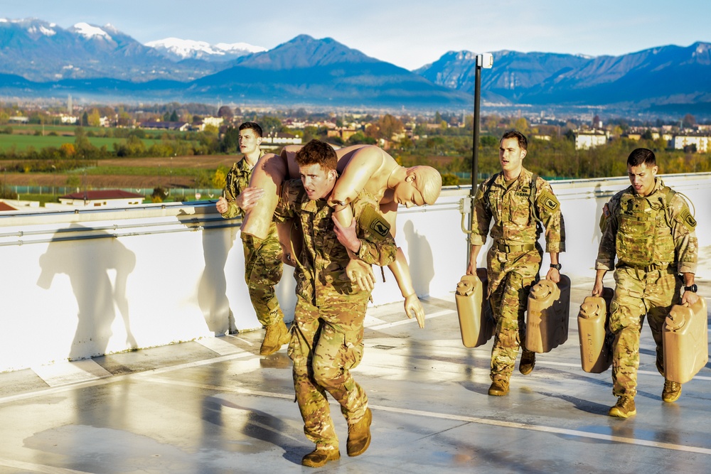 Paratroopers fireman carry dummies during The Brostrom Challenge