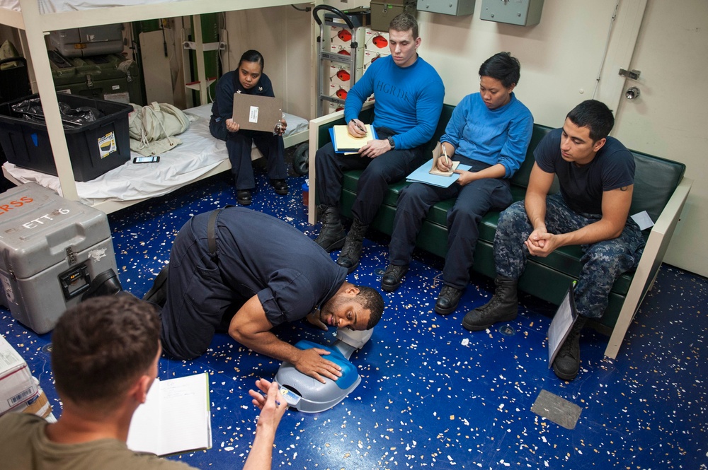 USS America Sailor holds CPR class