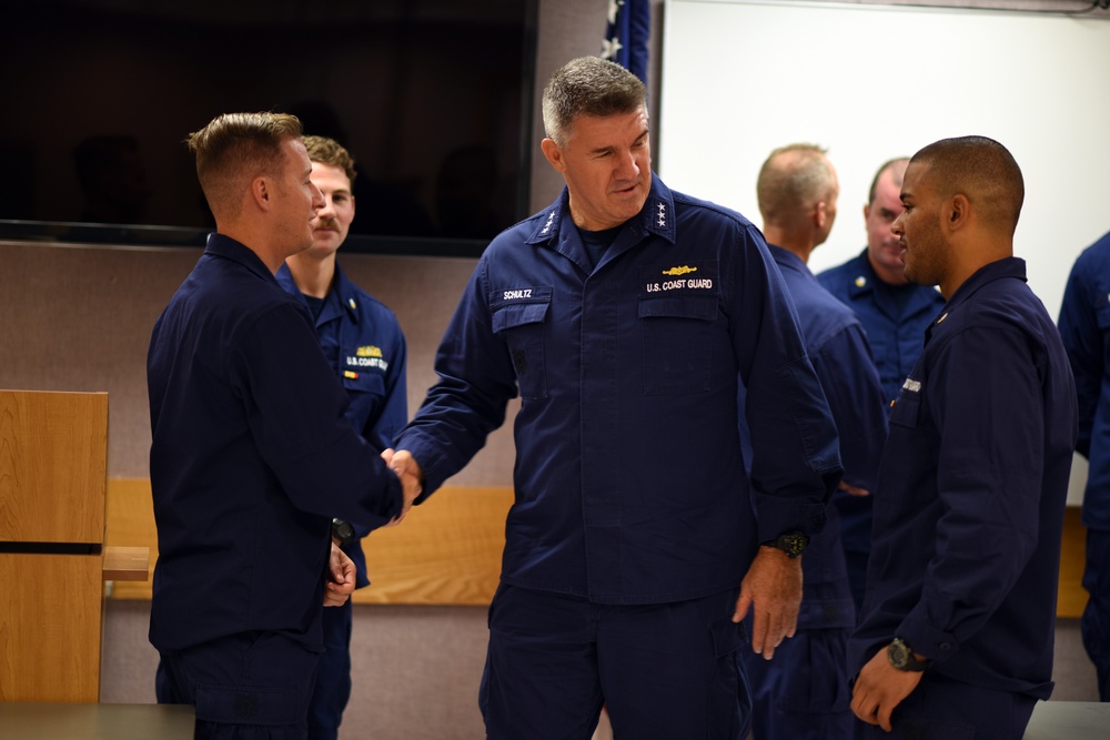 Vice Adm. Karl Schultz speaks with MSRT members after presenting them with the Navy Combat Action Ribbon