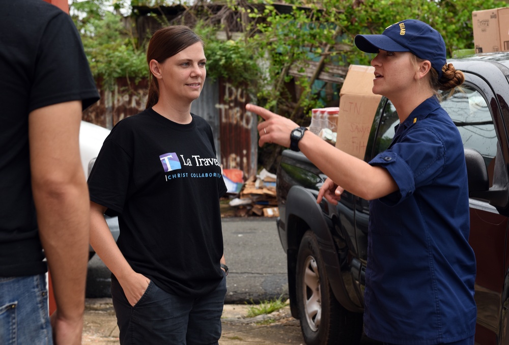 U.S. Coast Guard, local missionaries deliver goods to Loiza, Puerto Rico residents