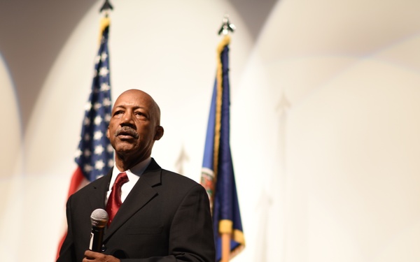 Retired admiral speaks during a Veterans Day event at NSU