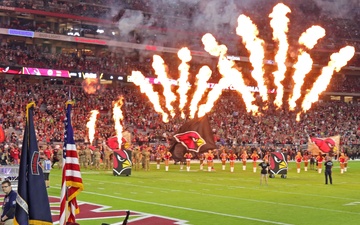 The U.S. Army Special Operations Command color guard presents the colors at  University of Phoenix Stadium prior to the NFL's Thursday Night Football, Arizona  Cardinals vs. Seattle Seahawks Salute to Service game