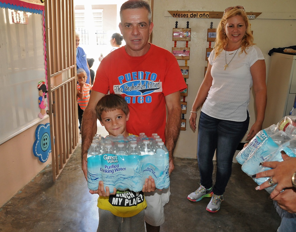 Food and water for the children in Orocovis