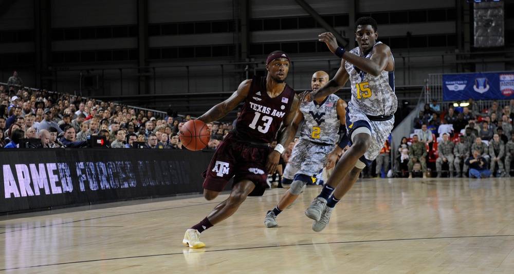 Aggies rout Mountaineers 88-65 in Armed Forces Classic