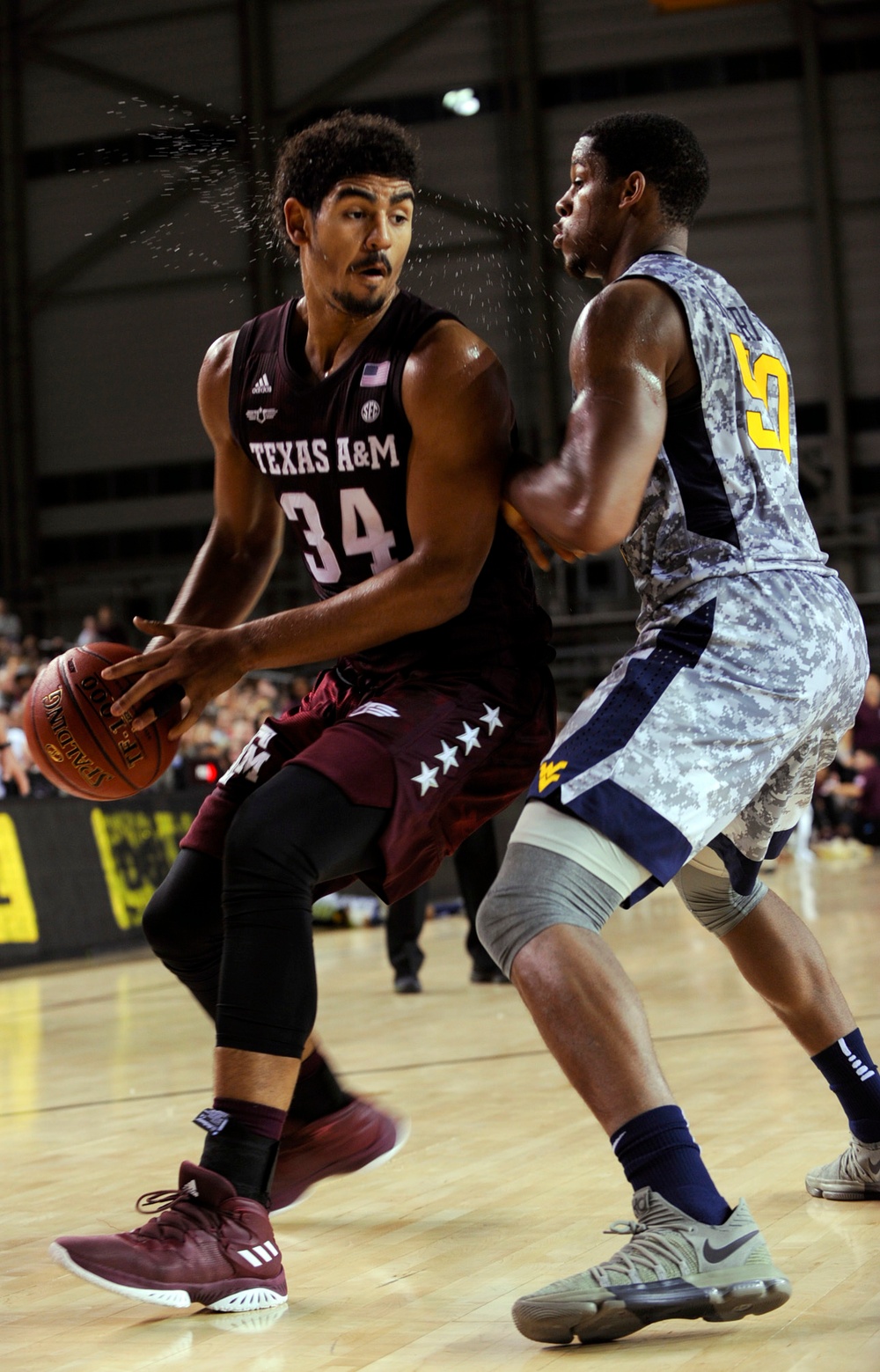 Aggies rout Mountaineers 88-65 in Armed Forces Classic