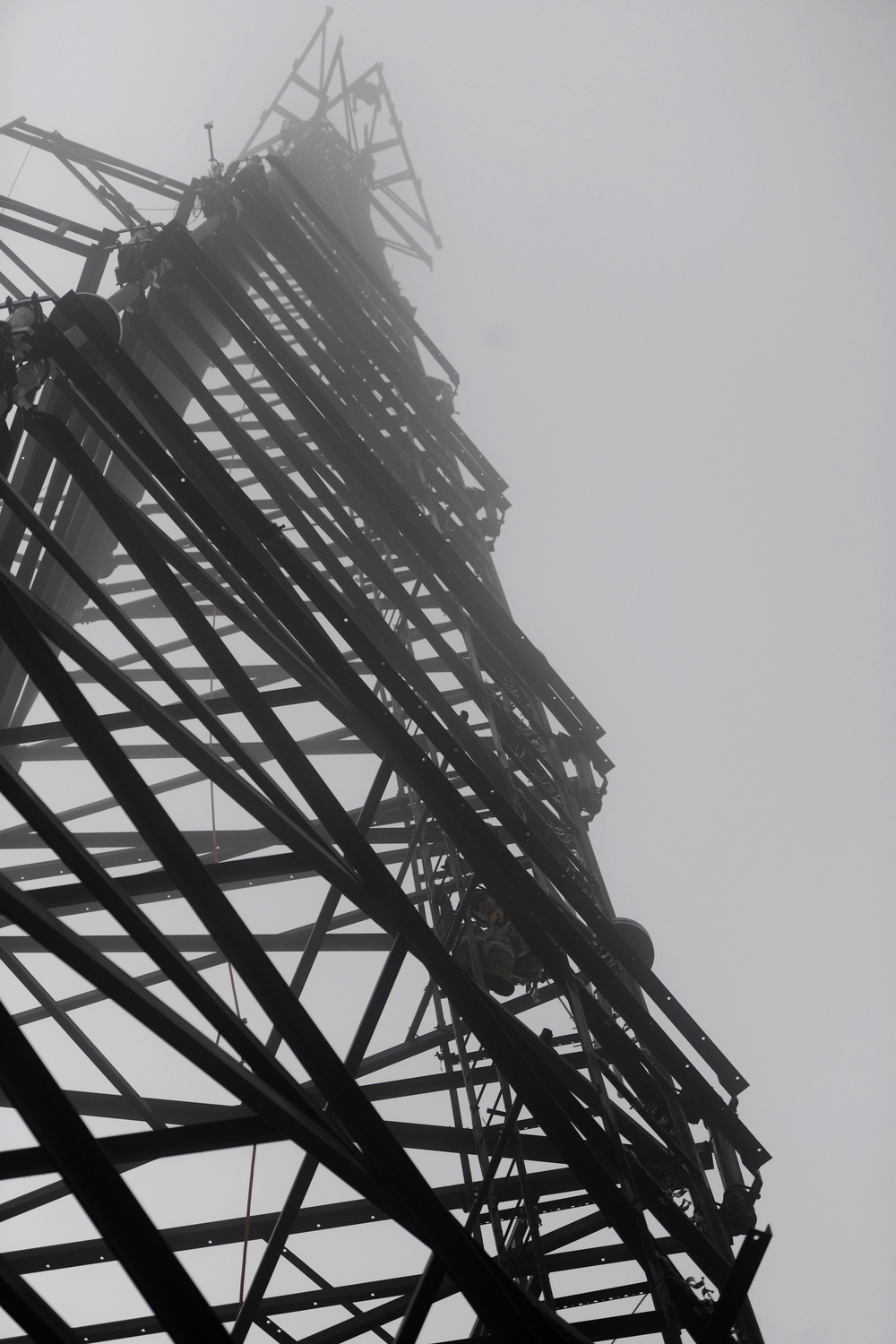 USAF Engineers atop fog shrouded tower