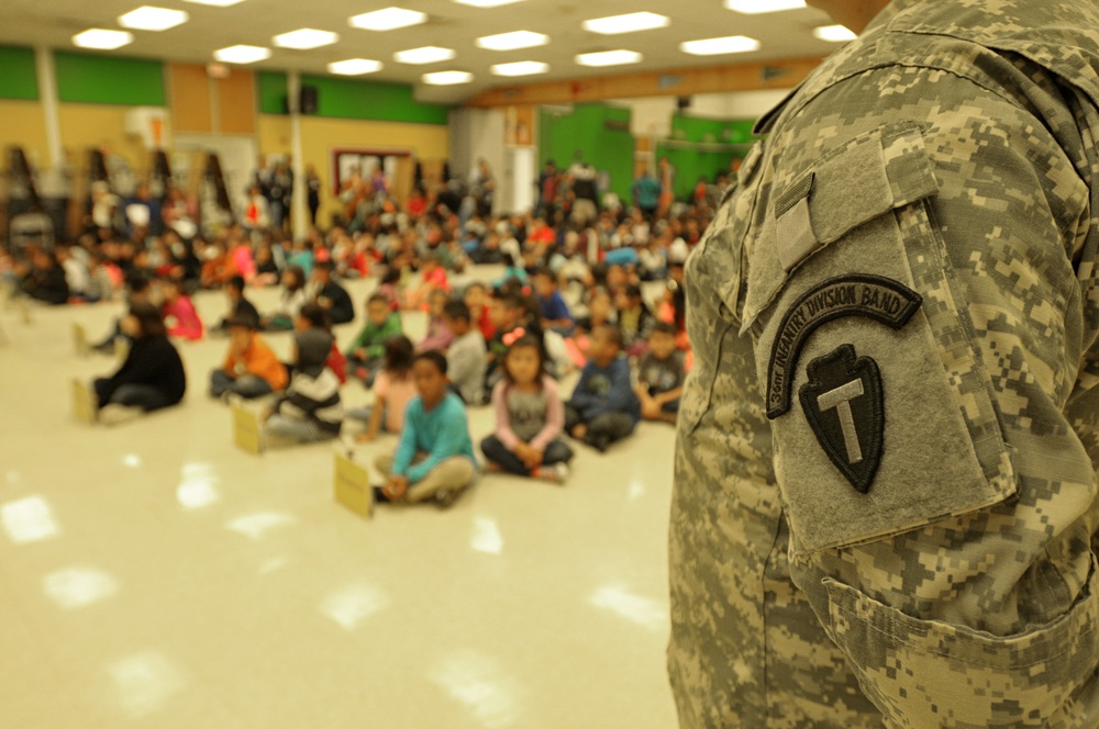 36th Infantry Division Band Plays at Member's School