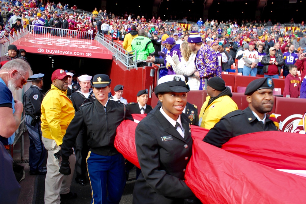 D.C.-area service members participate in the Washington Redskins Salute to Service match-up