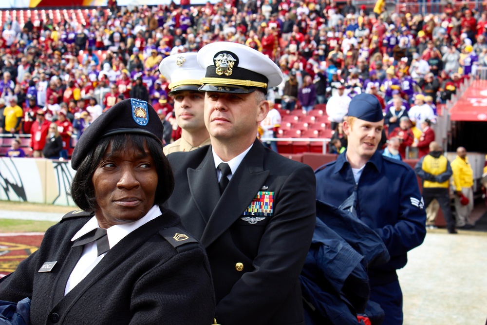 D.C.-area service members participate in the Washington Redskins Salute to Service match-up