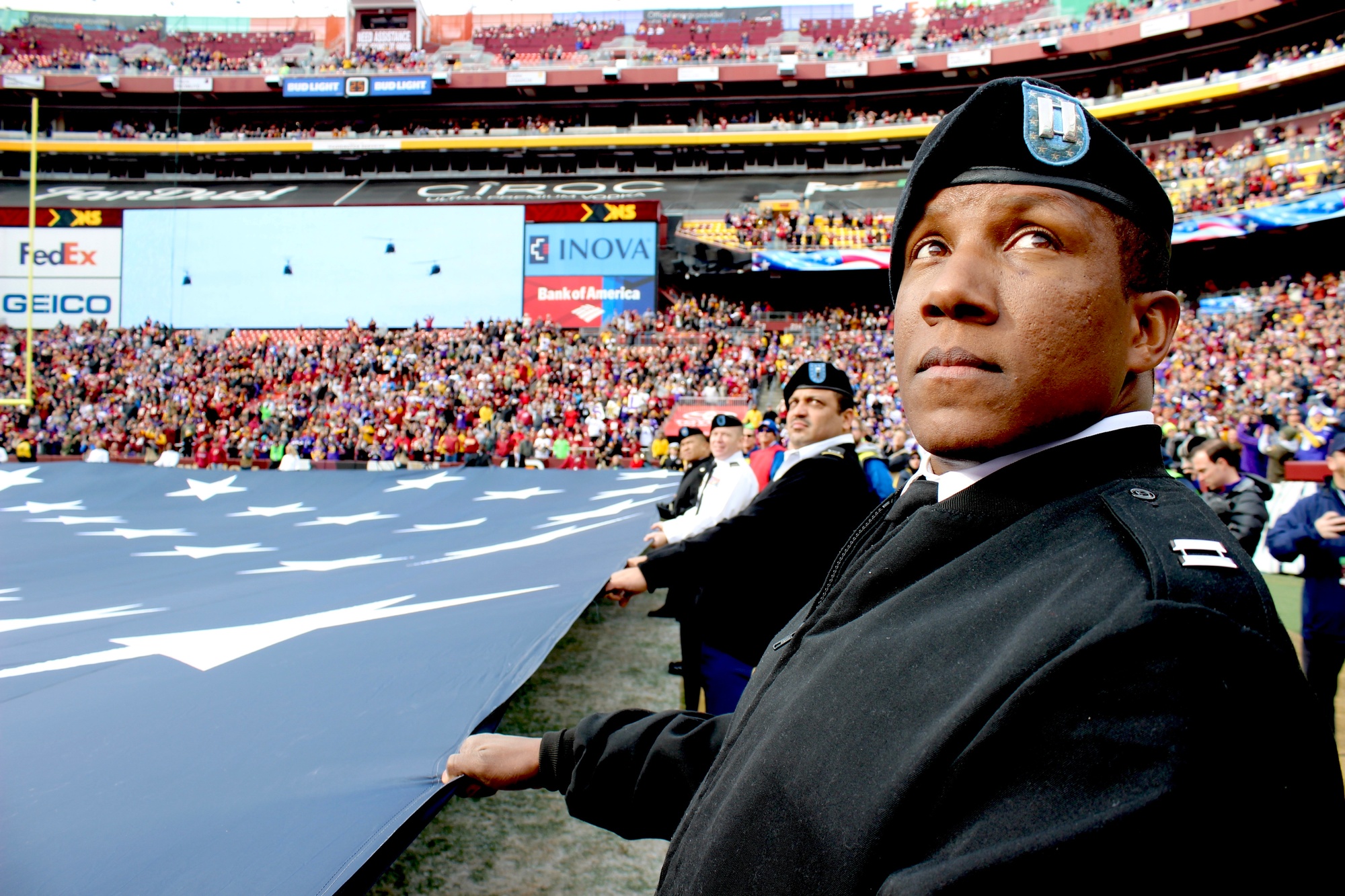 D.C.-area service members participate in the Washington Redskins Salute to  Service match-up against the Minnesota Vikings at FedEx Field on Nov. 12.  The event required 107 service members alone to unveil a