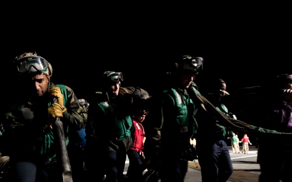 Sailors Conduct Drills Aboard USS John C. Stennis